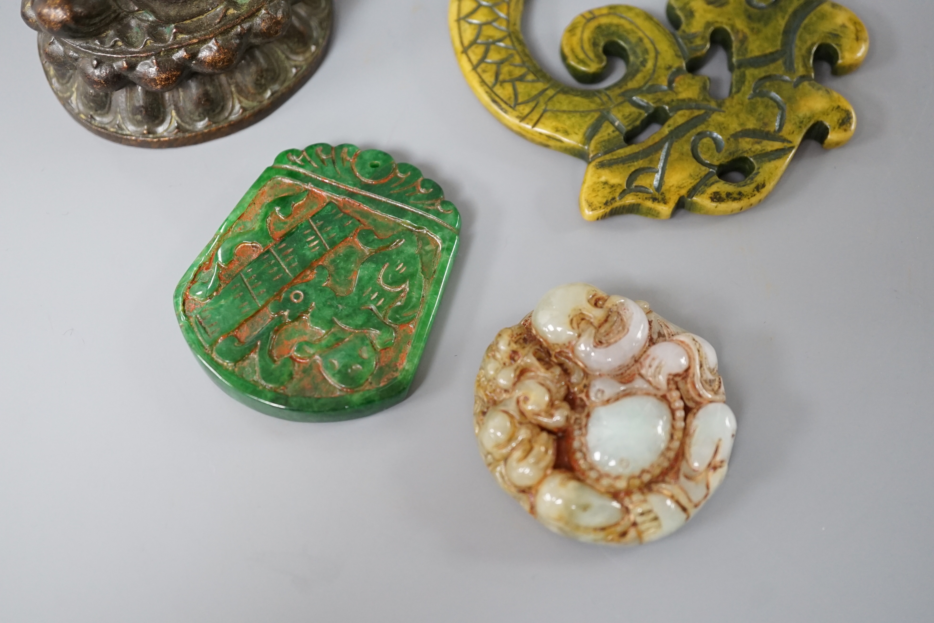Three Chinese hard stone carvings and a bronze Buddha, 9.5cm